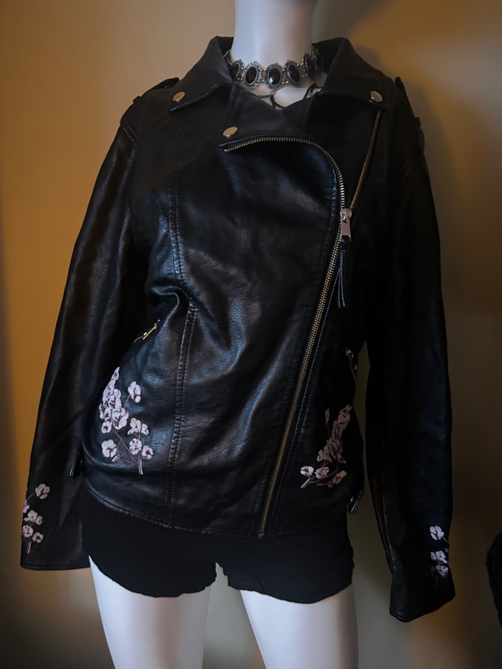 Women's Black Faux Leather Moto Jacket with Pink Floral Appliqué